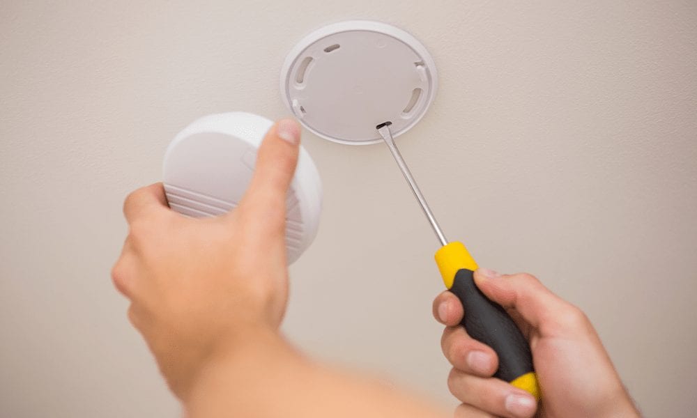 7 Outdoor (and Indoor) Home Maintenance Tips For This Spring Smoke Detector Image